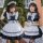 Two young girls wearing matching japanese girl black maid dresses, featuring ruffled details and bows, perfect for cute lolit...