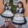 Two young girls wearing japanese girl black maid dresses, featuring white aprons with ruffles, bows, and matching headbands. ...