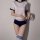 A woman models a japanese gymnastics outfit, featuring a white crop top with navy trim and matching navy shorts, paired with ...