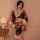 A woman poses elegantly in a japanese kimono-style lingerie set featuring a floral print, perfect for sensual photo shoots or...