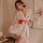 A woman wears a japanese kimono-style bathrobe with cherry blossoms, featuring an ice silk v-neck design, perfect for cosplay...