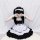 A woman wearing a japanese maid cosplay dress, featuring black and white colors with ruffles, sitting against a white backdro...