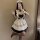 Japanese maid costume dress featuring a cute lolita style with ruffles and bows, perfect for cosplay or daily wear.