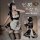 Japanese maid costume for women featuring cute cat ears, sweet design, and playful lolita style with a charming apron and sto...