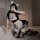 Japanese maid costume for women featuring cute cat ears, sweet lolita design with black and white checkered apron and bow acc...