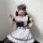 Japanese maid dress cosplay outfit featuring cute anime lolita style with ruffled sleeves, white apron, and black accents per...