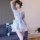 A woman poses in a light blue japanese maid outfit set, featuring a delicate kimono-style design with lace accents and sheer ...