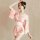 A woman models a japanese-style sexy lingerie set featuring a floral pattern, perfect for seductive kimono sleepwear and robe...