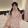 A woman wears a japanese-style sexy sleepwear set featuring a cute and seductive kimono robe adorned with bunny and maid deta...