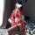 A woman poses playfully with steam from her mouth, wearing a vibrant red japanese-style sleepwear set featuring a kimono-insp...