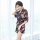 A woman models a japanese-style sheer lace robe with floral patterns, featuring a tie belt and kimono-inspired design, perfec...