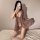 A woman poses with a smartphone, wearing a sensual brown lace sleepwear set from juhuo plus size. the dress features ruffled ...