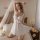 A woman poses elegantly in a kameixue sexy lace lingerie set, featuring sheer fabric and delicate lace details, creating a se...