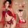 Model wearing red kouni hanfu lingerie set with floral embroidery, tassels, and sheer sleeves. back view shows strappy design...