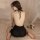 Woman wearing kouni sexy sleepwear deep v backless slip dress, a trendy bodycon nightgown for nightclub or lounge.