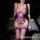 Woman modeling purple lace backless lingerie set with sheer mesh bra, steel underwire, and matching bodysuit with garters.