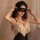 Sexy lace blindfold with sheer eye mask, part of a luxurious lingerie set featuring intricate designs for intimate moments.