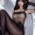 Sexy lace bodysuit with sheer mesh design and glossy black stockings, perfect for intimate wear.