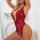 Sexy sheer lace bodysuit with open back and open-crotch design, elegant bridal lingerie set for women.
