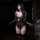 Woman wearing luxury lace bodysuit with sheer mesh, elegant cutouts, and long gloves in a dimly lit room.