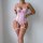 Pink lace bodysuit with butterfly straps, floral trim, and fishnet stockings. sexy european-american design.