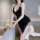 Sexy black lace cross-back silk sleep dress with delicate scalloped edges, perfect for romantic nightwear.