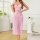Woman modeling pink lace lingerie set with mesh sleep dress and straps, elegant seductive nightwear for intimate moments.
