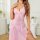Woman wearing pink lace erotic lingerie set with mesh sleep dress and delicate straps, showcasing seductive intimate apparel ...