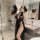 Elegant black lace nightgown featuring a heart neck strap design, sheer mesh fabric, and side slits for a seductive look. emb...