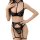Woman wearing black lace lingerie set with garter belt and halter bra, showcasing sexy pure and tempting sleepwear design.