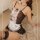 Sexy lace maid bodysuit with black lace trim, white apron, and stockings, perfect for sleepwear or roleplay outfits.