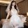 Woman in white lace mesh sheer deep v bodysuit with veil, choker, and garters – sexy low-cut erotic sleepwear set.