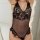 Sexy lace bodysuit with open crotch design, featuring polka dot mesh and delicate straps, perfect for women seeking elegant s...