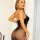 Woman wearing black lace polka dot bodysuit, showcasing lightweight flirty intimate wear for women in plus size erotic linger...