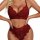 Woman modeling a deep red lace lingerie set featuring a scalloped bralette and matching high-waist panties.