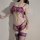 Woman wearing purple lace sheer lingerie set with thong, bralette, and stockings — seductive see-through design for pure temp...