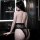 Woman wearing black lace sheer bodysuit, sexy mesh transparent lingerie set for women, seductive sleepwear and intimate appar...