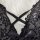 Lace sheer bodysuit featuring intricate floral patterns, delicate crisscross straps, and elegant black satin bow detail, perf...