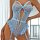 Woman wearing light blue luxury lace sheer lingerie set with intricate floral patterns and elegant straps.