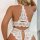 Woman wearing white lace sheer open-crotch bodysuit, sexy sleepwear with intricate back design, -style erotic lingerie.