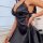 Elegant black satin sleep dress with intricate lace detailing, perfect for women seeking luxury and comfort. ideal for intima...