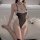 Sexy open-crotch lace bodysuit with ruffled details, perfect sleepwear set for women.