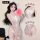 Woman modeling white lace temptation bodysuit with sheer lace, open-crotch design, and garter straps.