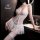 Sexy lace bodysuit with beaded tie-string design, sheer fabric, perfect for intimate wear and sleepwear.