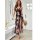 A woman stands elegantly holding a bouquet, wearing a black lace trim strap nightgown with a sexy sheer split front and flora...