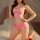 A woman poses wearing a pink lace-trimmed sexy sleep dress featuring heart patterns, designed for elegance and comfort.