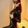 Sexy latex catsuit for women featuring pvc bondage design, open-crotch style, perfect for club or stage performances.