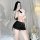 Woman in white blouse and black skintight pencil skirt posing in bedroom. lemon story seductive air hostess costume for sexy ...
