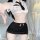 Woman wearing lemon story seductive air hostess costume with white crop top, black tie, and skintight pencil skirt for ol rol...
