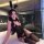 A woman poses in a black bunny-themed lingerie set, featuring lace details and stockings, perfect for a couples date night.